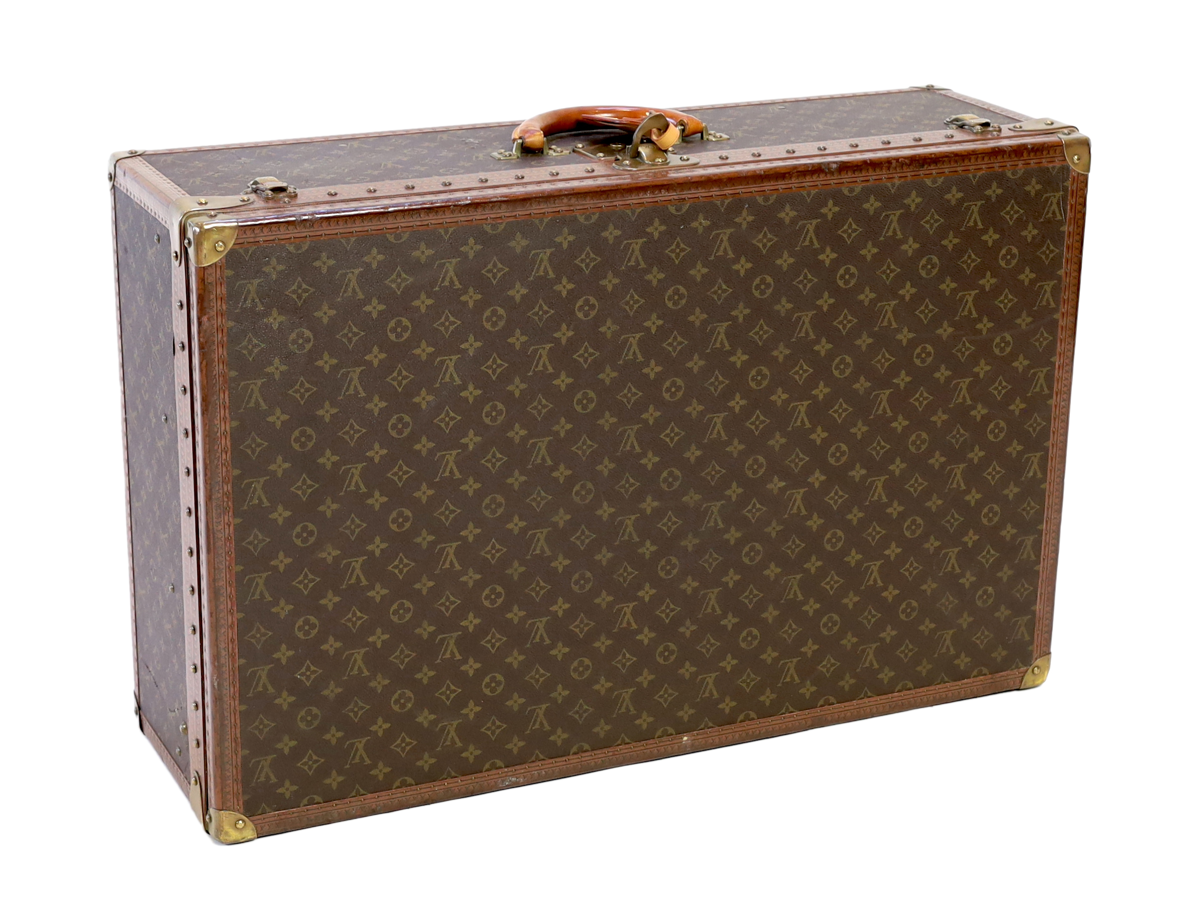 A Louis Vuitton monogram canvas and tan leather suitcase, width 81cm, depth 26cm, height 52cm